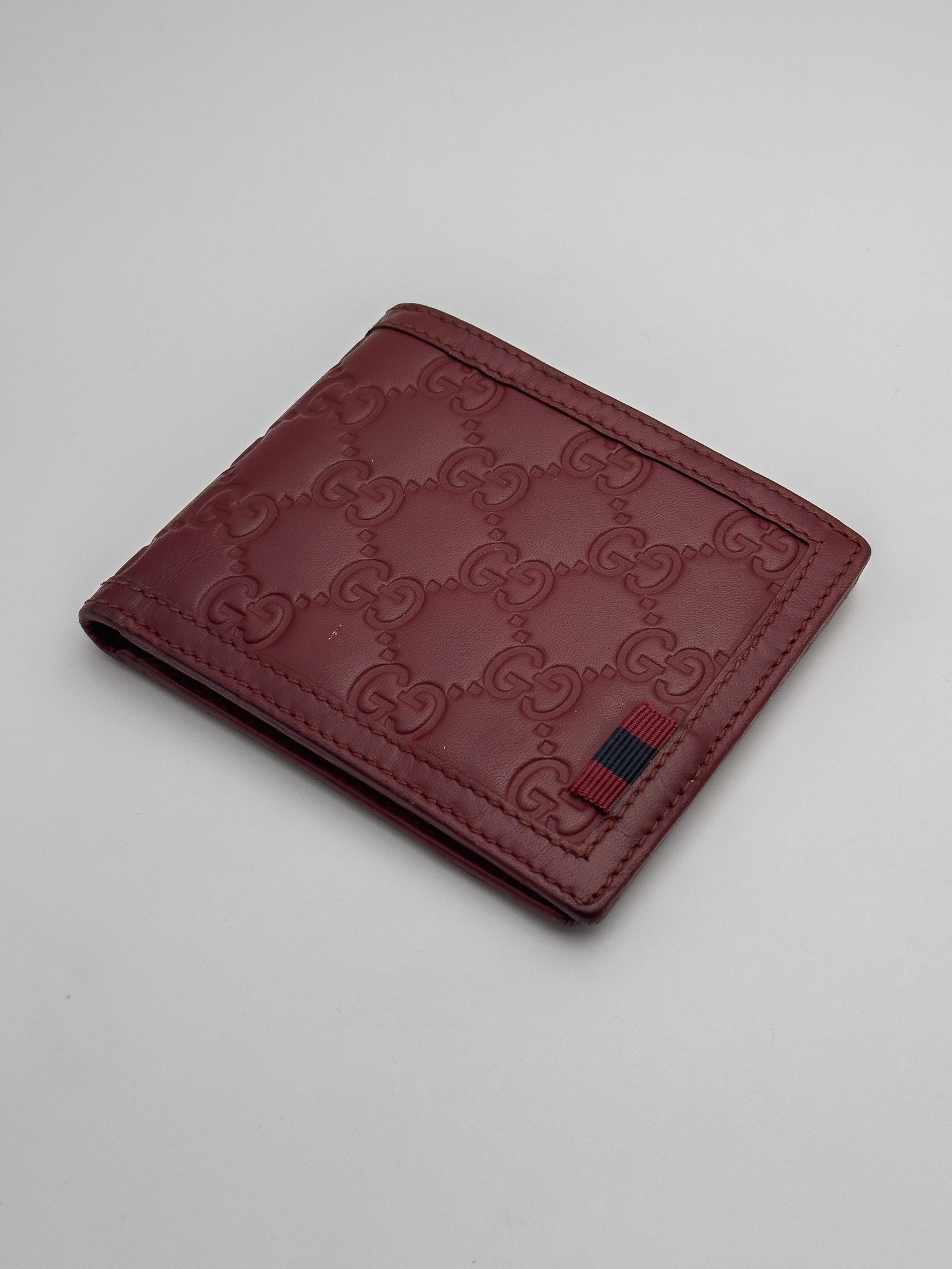 Gucci - Portefeuille en cuir GG rouge