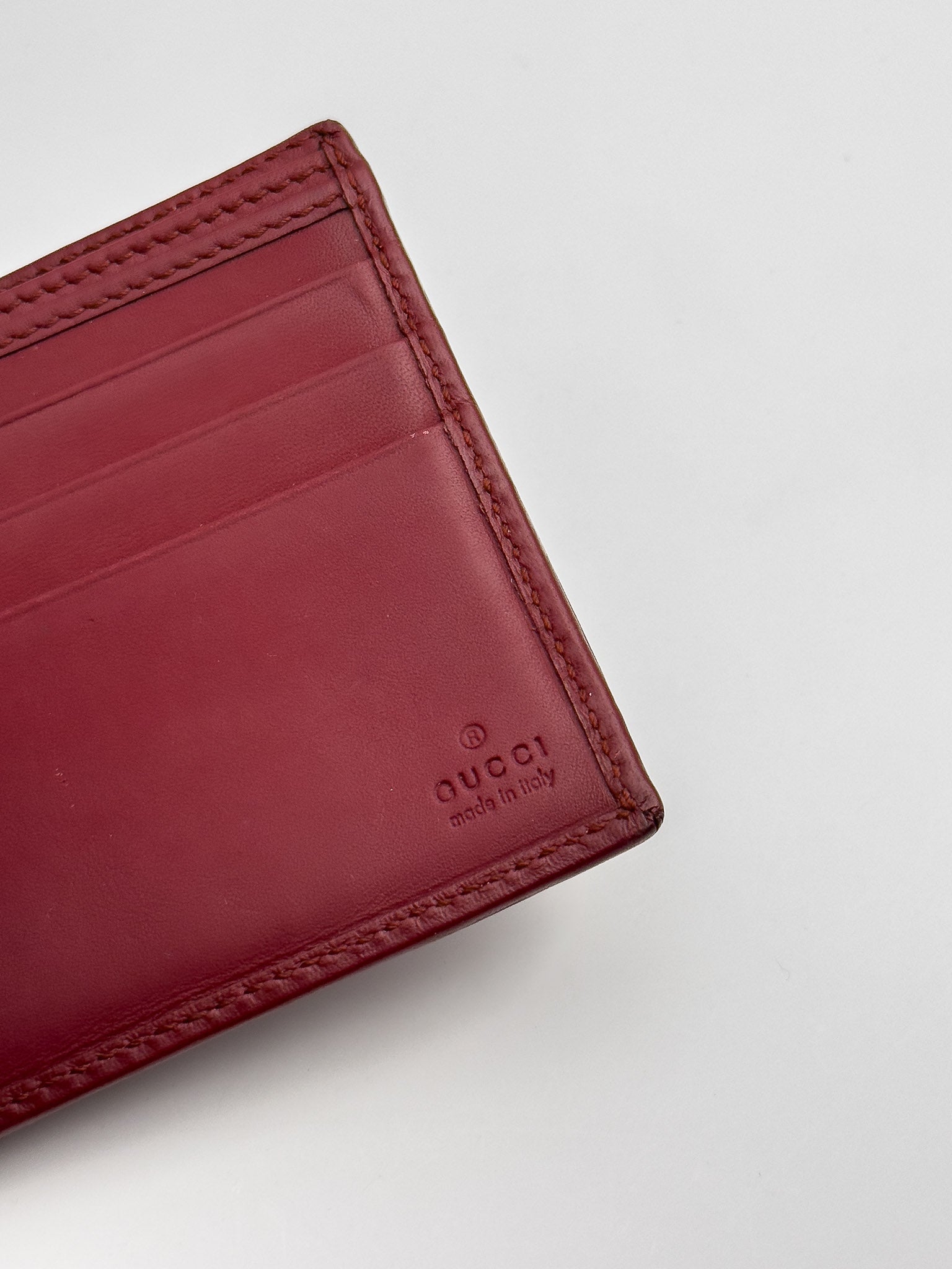 Gucci - Portefeuille en cuir GG rouge